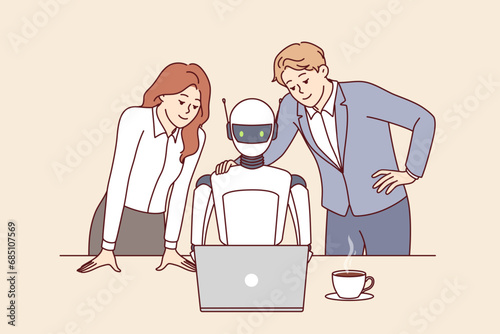 Robot employee of company and two human colleagues work together to complete tasks using laptop with innovative software. Robot with artificial intelligence sits at desk helping office clerks.