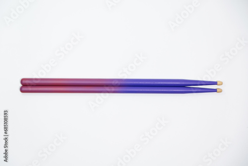 Colored Gradient Drumsticks on a white background