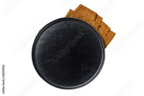 Table setting with vintage empty black plate on rustic wood. Transparent background. Isolated.