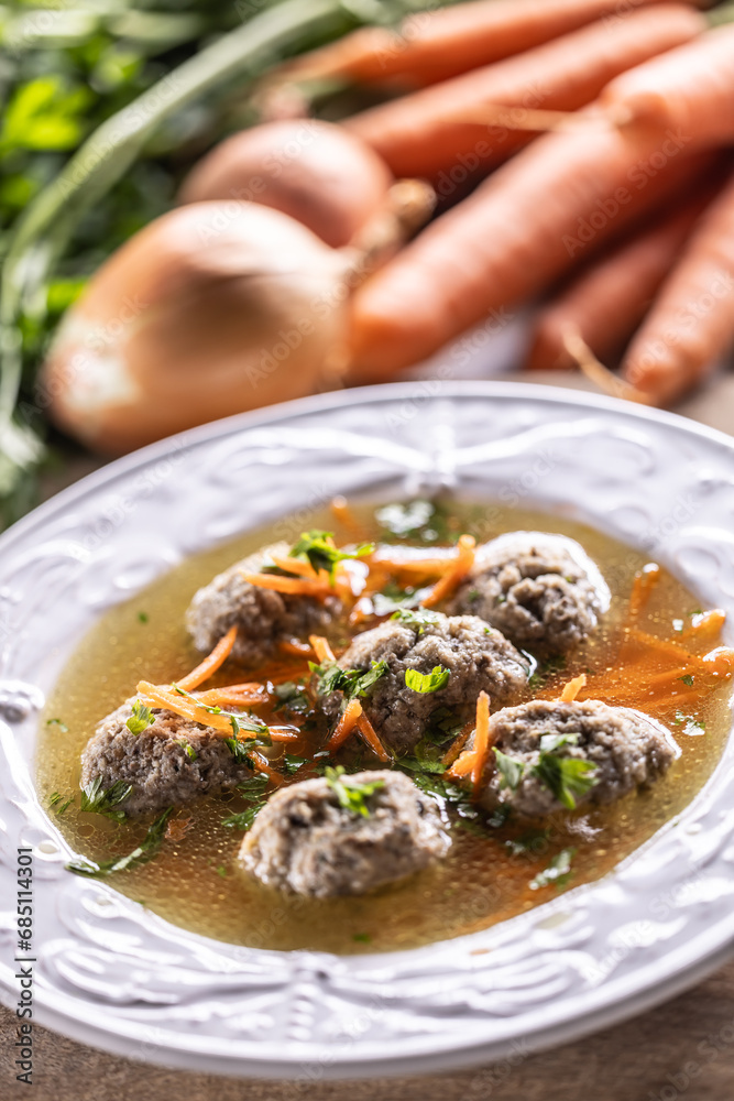 Broth with liver dumplings made from beef liver, bread, eggs and parsley cooked in beef broth.