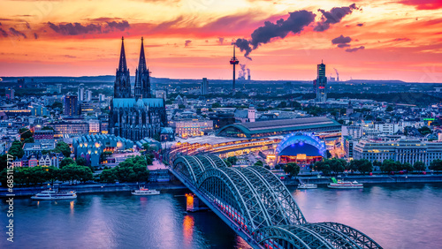 Cologne Koln Germany during sunset, Cologne bridge with the cathedral. beautiful sunset at the Rhine River with a view at the Hohenzollern bridge and the skyline of Cologne photo