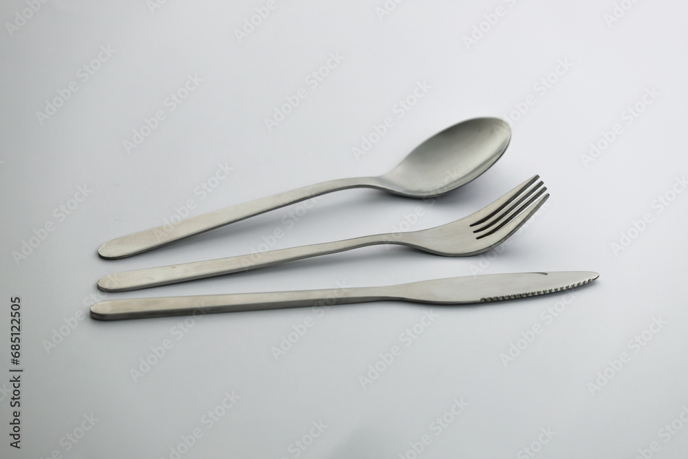 Fork, knife and spoon isolated. Cutlery on white background. Fork, knife and spoon isolated. Cutlery on white background.