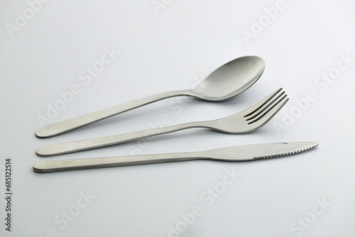 Fork, knife and spoon isolated. Cutlery on white background.
