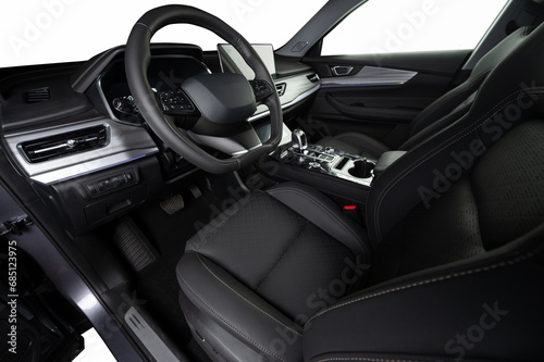 Modern car interior with screen and leather © PixieMe