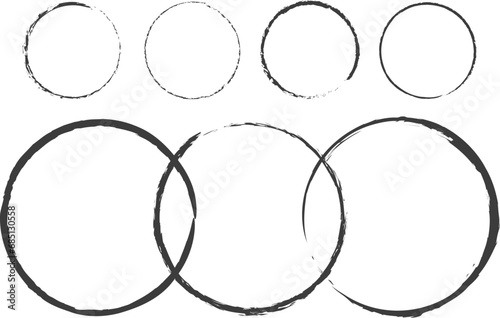 Various vector circles on a white background. Circles drawn with a brush on a white background. Illustration of various circles - large and small in black. Abstraction of figures. EPS 10