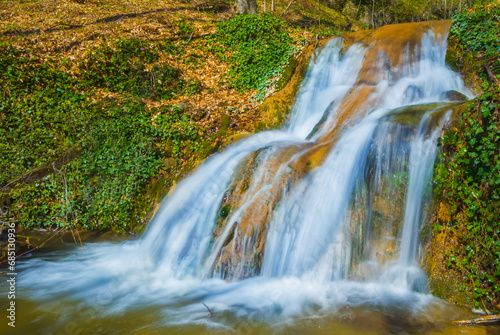 Fototapeta Naklejka Na Ścianę i Meble -  small waterfall  on the mountain river