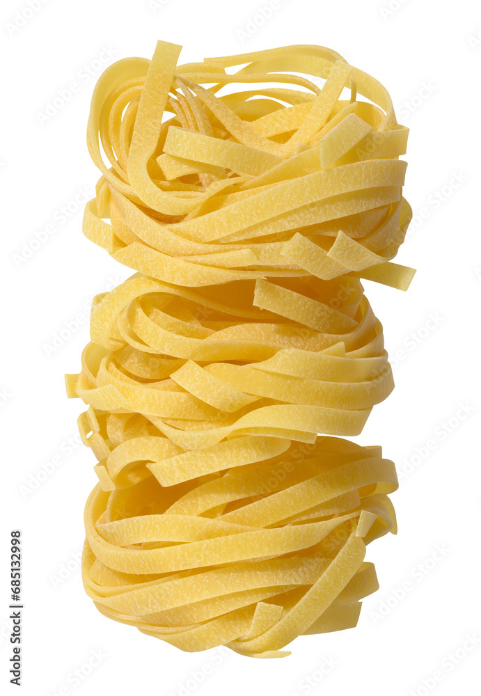 Twisted nest of raw pasta on white background Twisted nest of raw pasta on white background