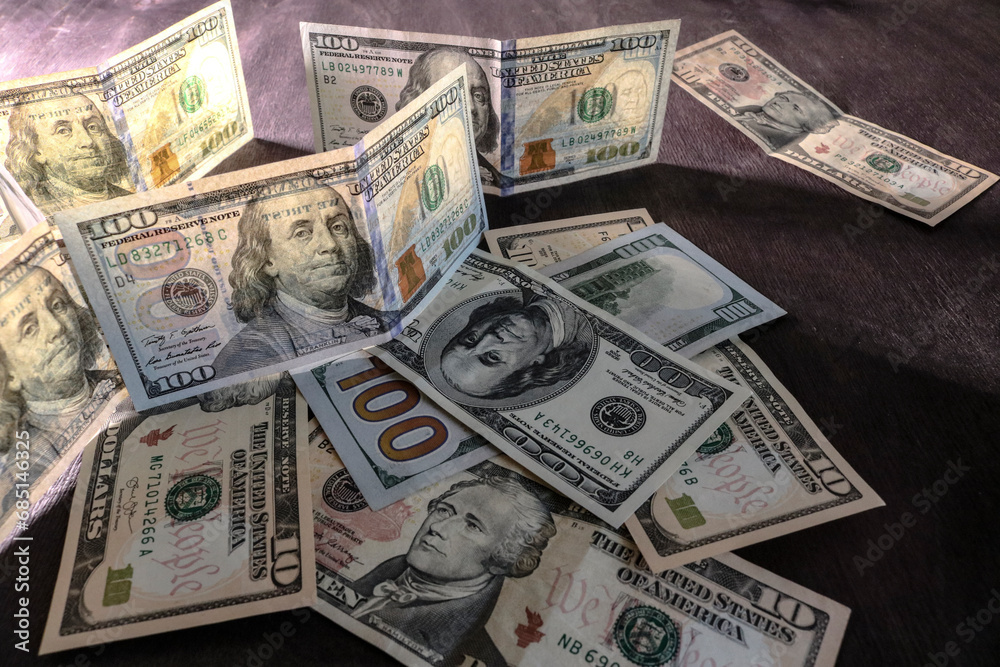 Cash money background, dollar banknotes. US dollars, USD finance theme. Cash money background, dollar banknotes. US dollars, USD finance theme.