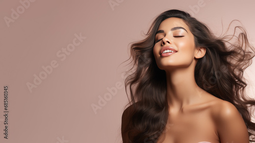 A latin woman breathes calmly looking up isolated on pastel background
