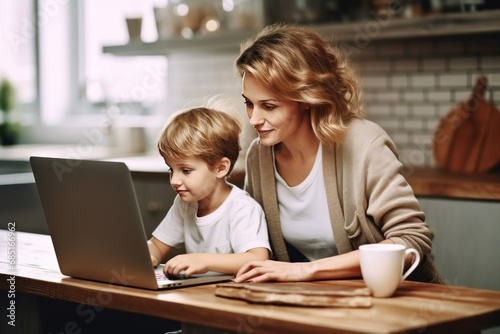 mother and child  boy using laptop