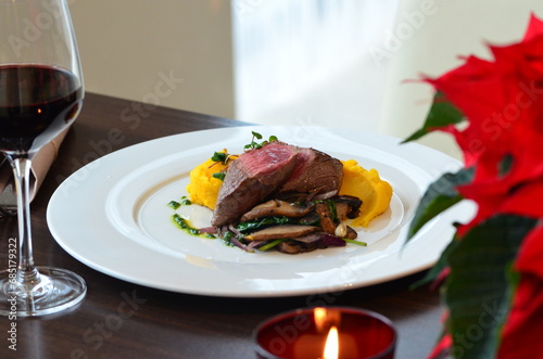 rump steak with yellow pure serving white plate