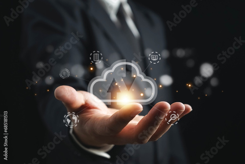Businessman showing to virtual artificial intelligence with cloud computing technology transformation and internet of thing. Cloud technology management big data include business strategy.Data storage