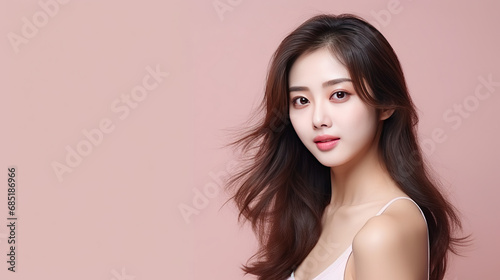 photography of beautiful korea woman, skin clean for cosmetic. pastel pink wall background.