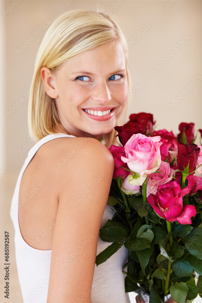Woman, rose bouquet and smile with face, beauty and arrangement with studio background, happy and gift. Look, female model and flowers for love, present and valentines day with romantic gesture
