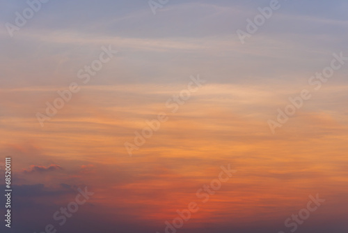 Orange and blue sunset sky gradient, copy space background. Red evening sky.