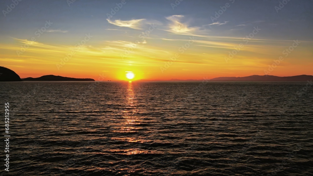 Obraz premium Aerial view of seascape at sunset