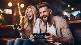 young couple playing video game, sitting on couch