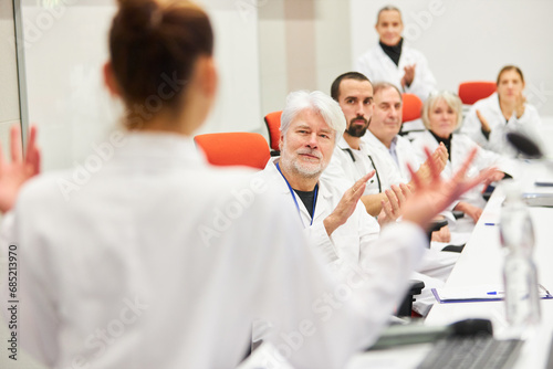 Doctors panel discussing during medical conference at auditorium photo