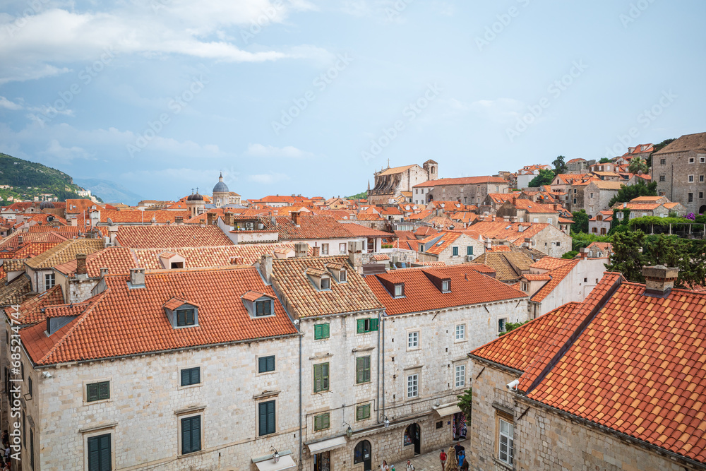 View to the red roofs of Dubrovnik Old town on cloudy summer day.