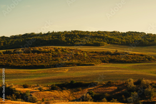 Beautiful rural landscape during autumn time over hills.