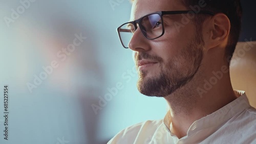 Overworked male employer. Man working in office takes off eyeglasses because he need to sleep. Stressed workaholic guy can't concentrate on financial reports. Businessman has big problems with taxes photo