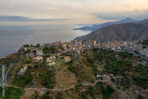 Aerial view of old medieval town of Forza d'Agro and coastline, Messina, Sicily, Italy photo