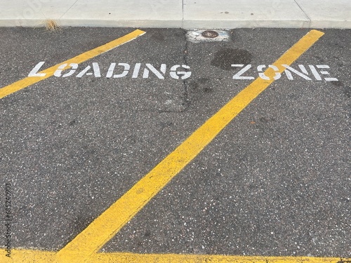 Parking loading zone pavement yellow lines