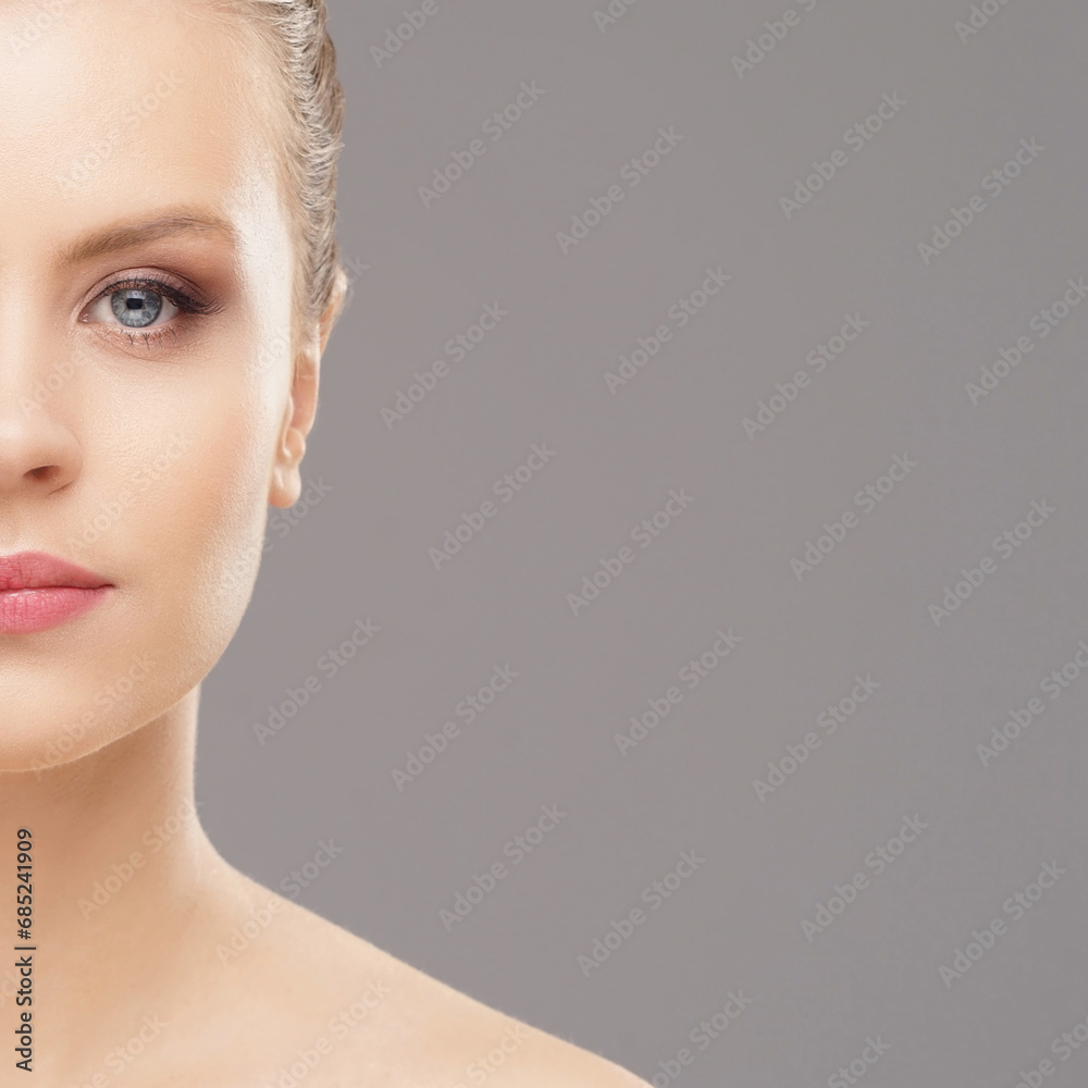 Close-up portrait of beautiful, fresh, healthy and sensual girl over grey background Close-up portrait of beautiful, fresh, healthy and sensual girl over grey background