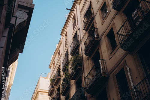 colonial architecture of Europe, balconies of an old house in Europe, old quarter in Barcelona, symbol of Catalonia © Andrii