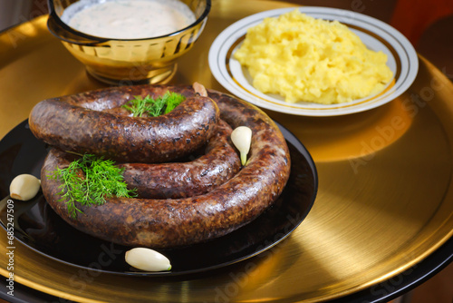 Liver sausage with garlic and herbs. Caucasian Circassian cuisine photo
