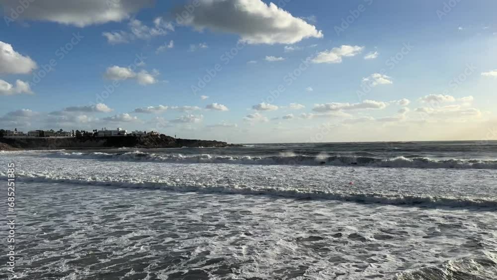 Sea on Cyprus. Beautiful waves on the sea. Storm on the sea. Coast. sunset, sandy beach Sea on Cyprus. Beautiful waves on the sea. Storm on the sea. Coast. sunset, sandy beach