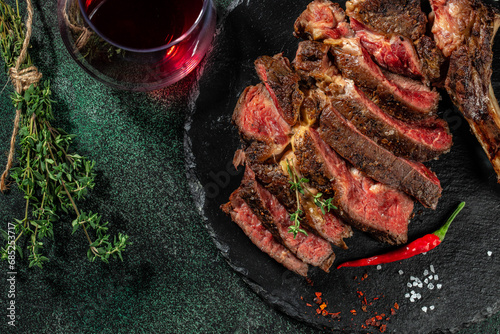 Grilled sliced beef steak with red wine. banner, menu, recipe copy space, top view