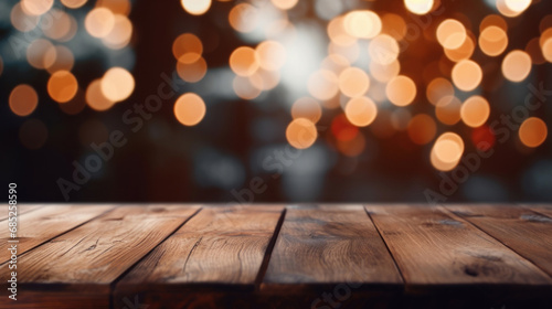 Wooden table and golden bokeh background © tashechka