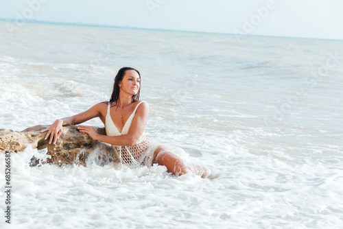 travel rest woman in the sea on the beach walk