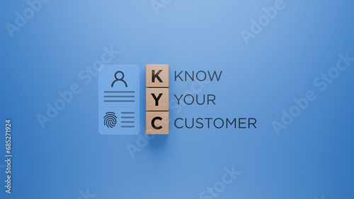 Wooden blocks with KYC acronym, identification card icon with fingerprint, know your customer concept, business and finance verification