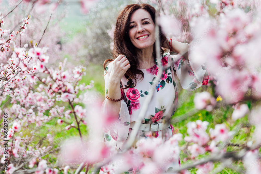 spring nature travel walk beautiful woman brunette in flowering trees spring nature travel walk beautiful woman brunette in flowering trees