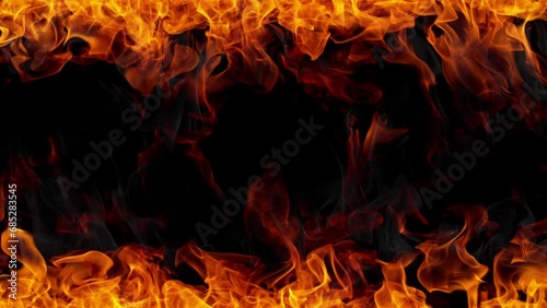 Super slow motion of fire flames isolated on black background. Filmed on high speed cinema camera at 1000 fps photo
