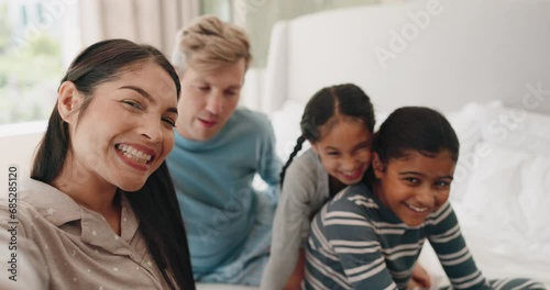 Funny face, selfie and family in home bedroom, bonding and laugh together. Profile picture, happy and parents with kids, interracial mother and dad with photo portrait for social media after adoption photo