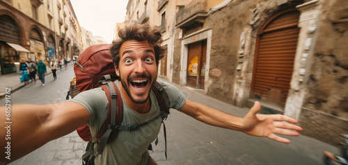 Fototapeta Naklejka Na Ścianę i Meble -  Extremely excited tourist taking a selfie shot on the streets of Rome