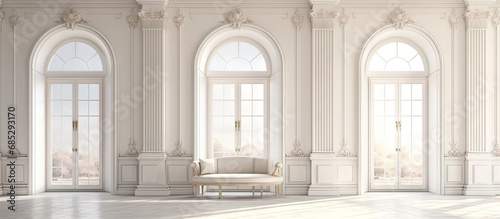 Luxurious light interior design in a mansion with stucco walls high windows and square columns copy space image photo