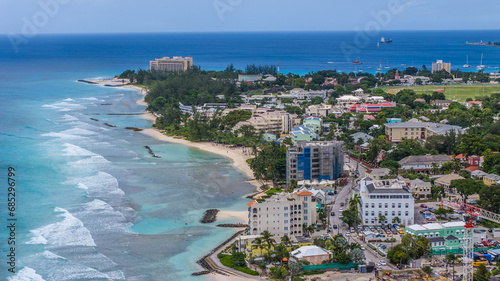 aerial landscape view of a costal area in the parish of Christ Church located in the south part of Bridgetown, Barbados with white sand beaches and turquoise water as well Drill Hall Beach in back