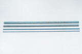 iron threaded stud on a white background. metal rod with thread on a light background. construction long bolt with thread for fastening
