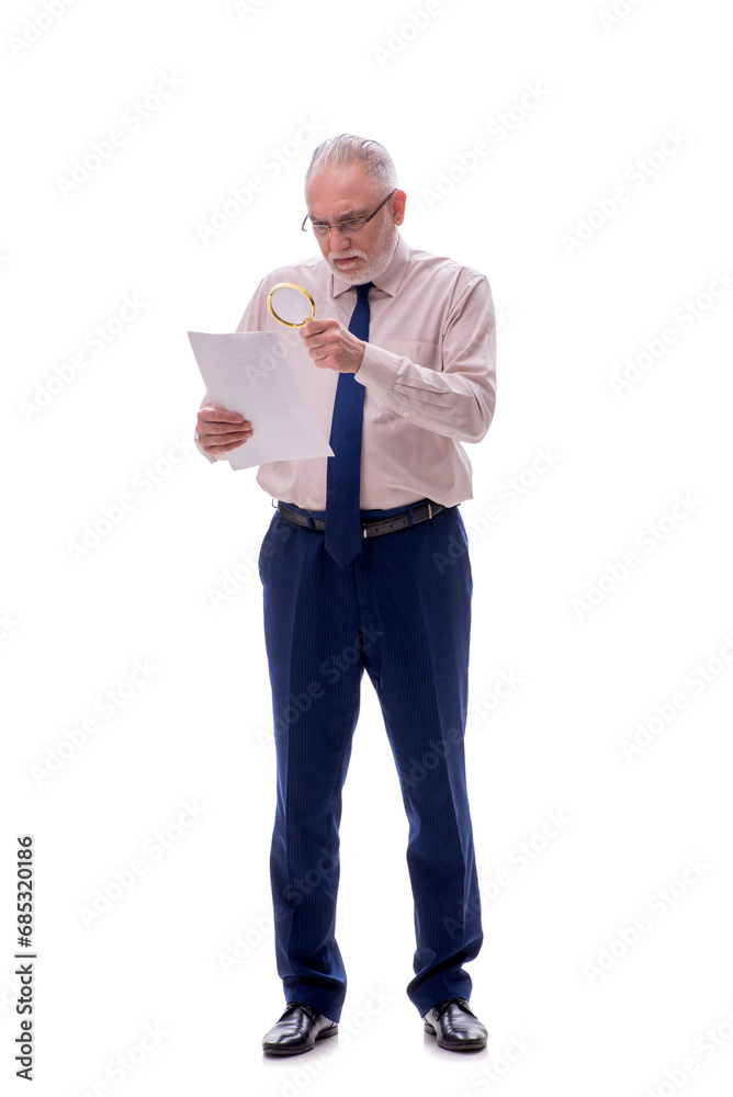 Old businessman holding loupe isolated on white Old businessman holding loupe isolated on white