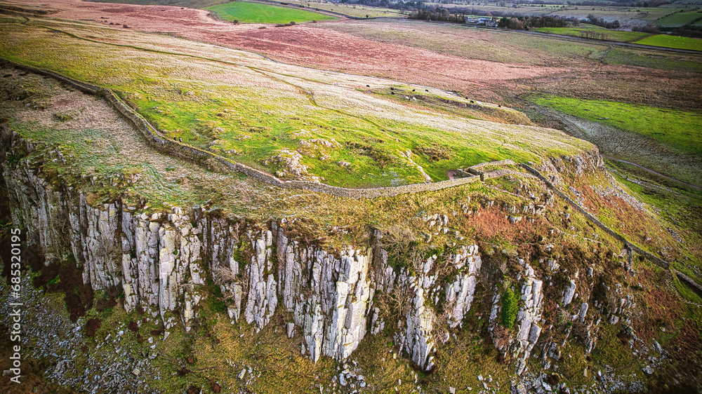 Scenic aerial landscape photo of the nature at Sycamore Gap, UK Scenic aerial landscape photo of the nature at Sycamore Gap, UK