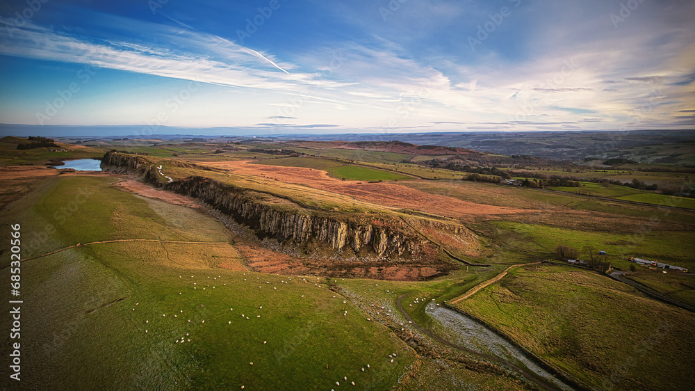Naklejka premium Scenic aerial landscape photo of the nature at Sycamore Gap, UK