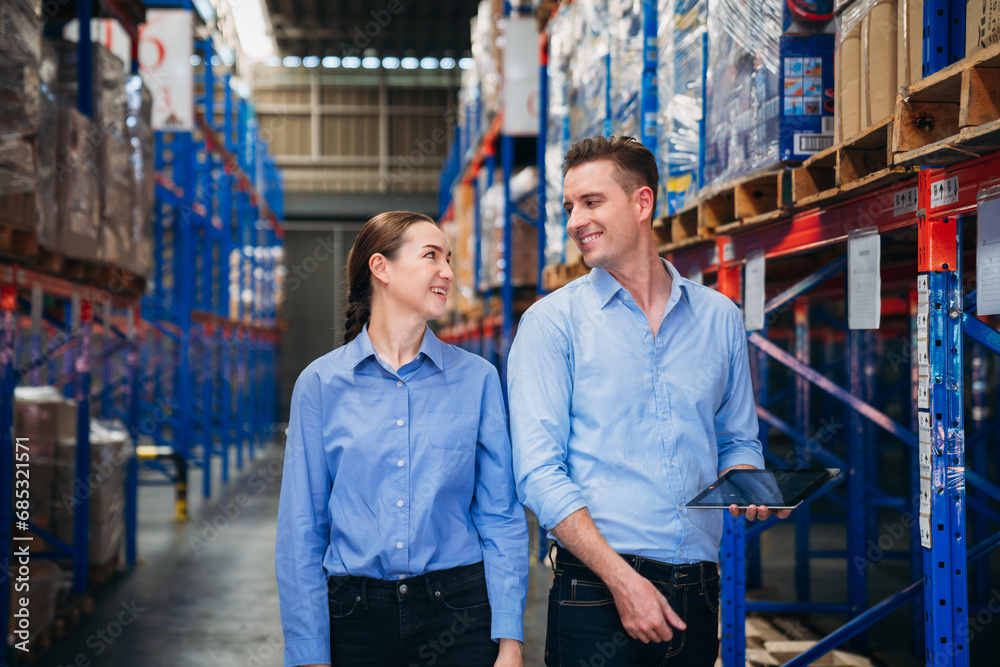 Worker in the warehouse checking the stock is on the shelves at the manufacturing. Engineer is working in the warehouse. Worker in the warehouse checking the stock is on the shelves at the manufacturing. Engineer is working in the warehouse.