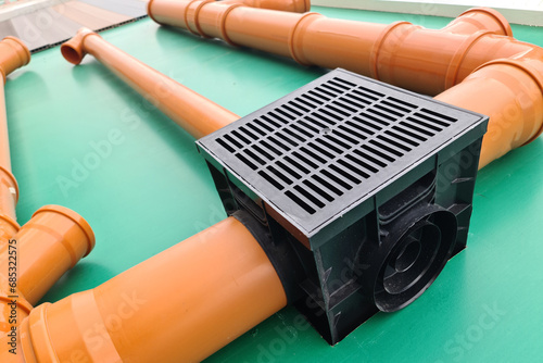 Картината върху платно Underground French Drain System, street sewer plastic pipes assembled together with a water inlet at the store stand