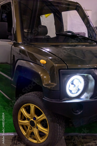 Small electric pickup truck green. photo