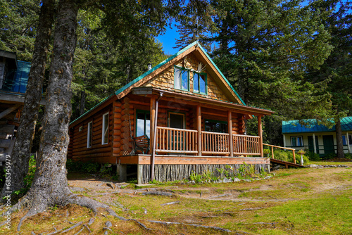 Fényképezés Log house of the Historic Taku Glacier Lodge, a wooden cabin located on the shor