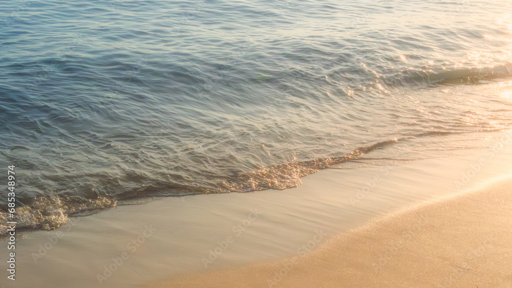 Fototapeta premium Soft beautiful ocean wave on sandy beach. Background.